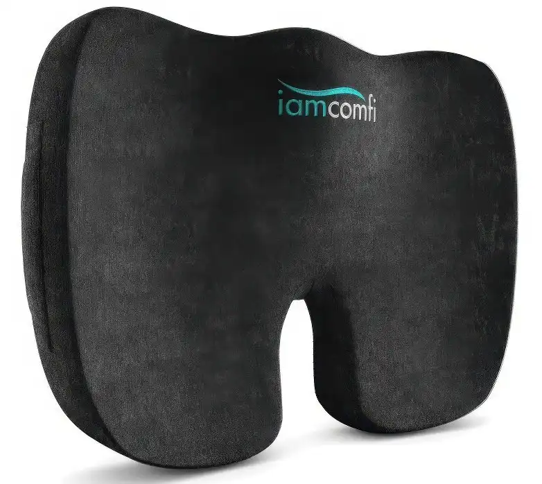 Comfortable memory foam neck pillow for travel and relaxation, ideal for long journeys and flights.